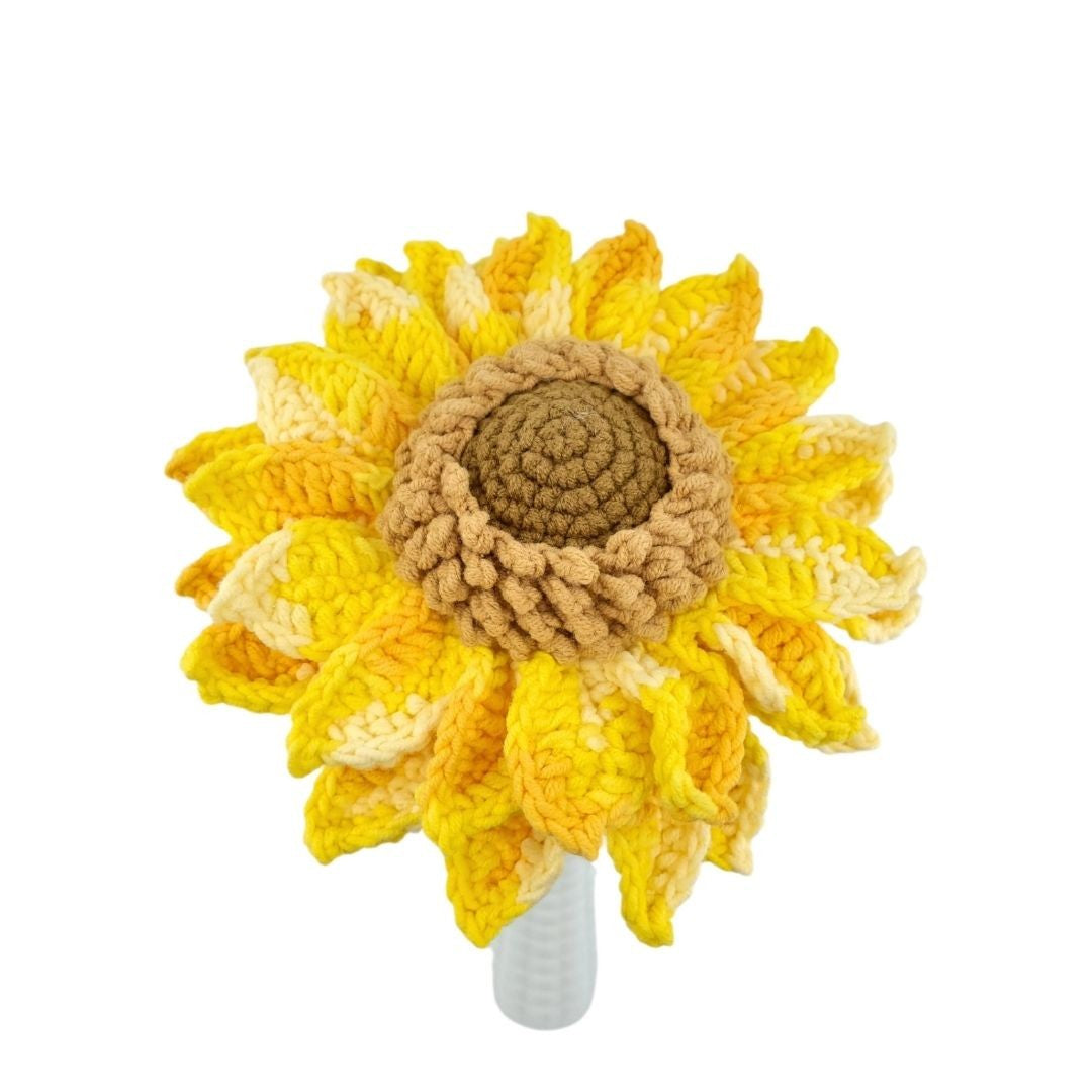 Crocheted sunflower with a white background