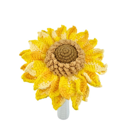 Crocheted sunflower with a white background