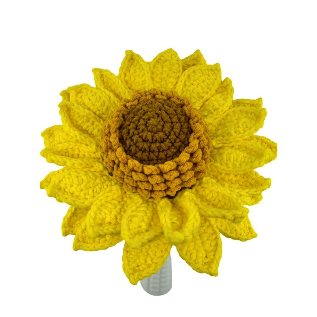 Crocheted sunflower on a white background