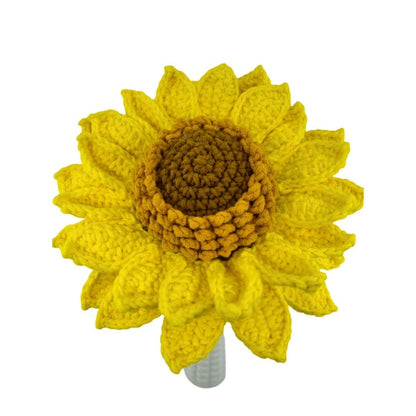 Crocheted sunflower on a white background